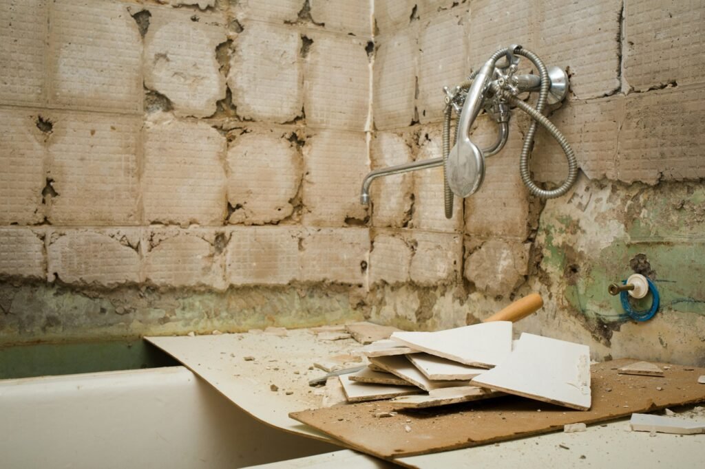 old bathroom without renovation. chipped tile. preparation for home renovation